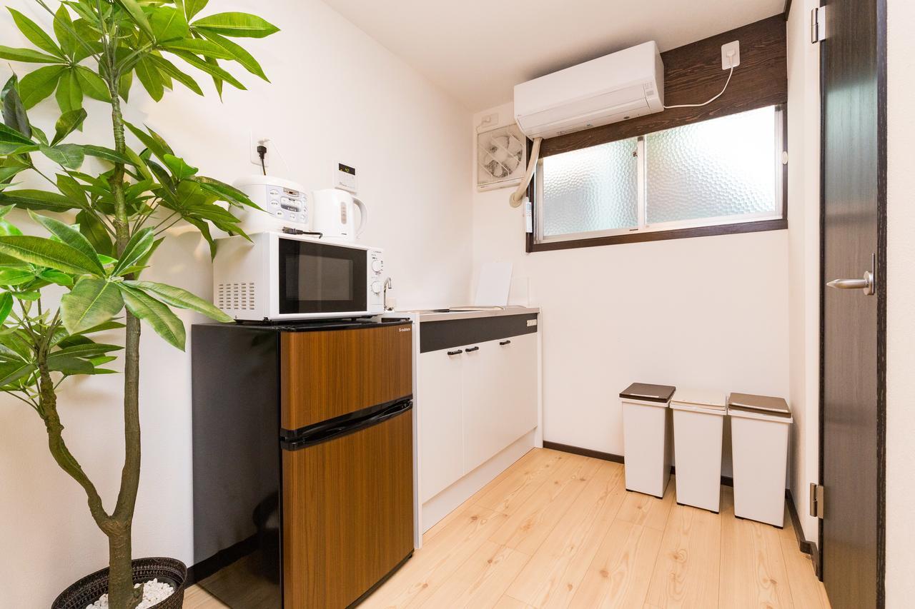 Ermitage Osaka Dome Apartment Bagian luar foto